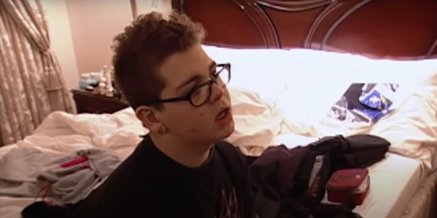 Jack Osbourne sitting on a bed in 'The Osbournes'