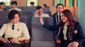 Kitty Song Covey trying to high-five Min Ho Moon in XO, Kitty Season 2