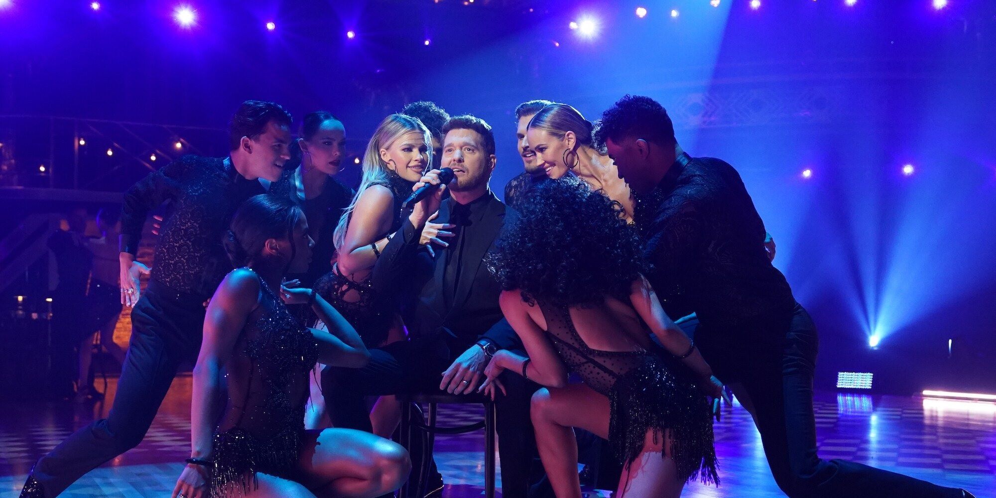 Michael Bublé sings while surrounded by dancers on Dancing with the Stars.