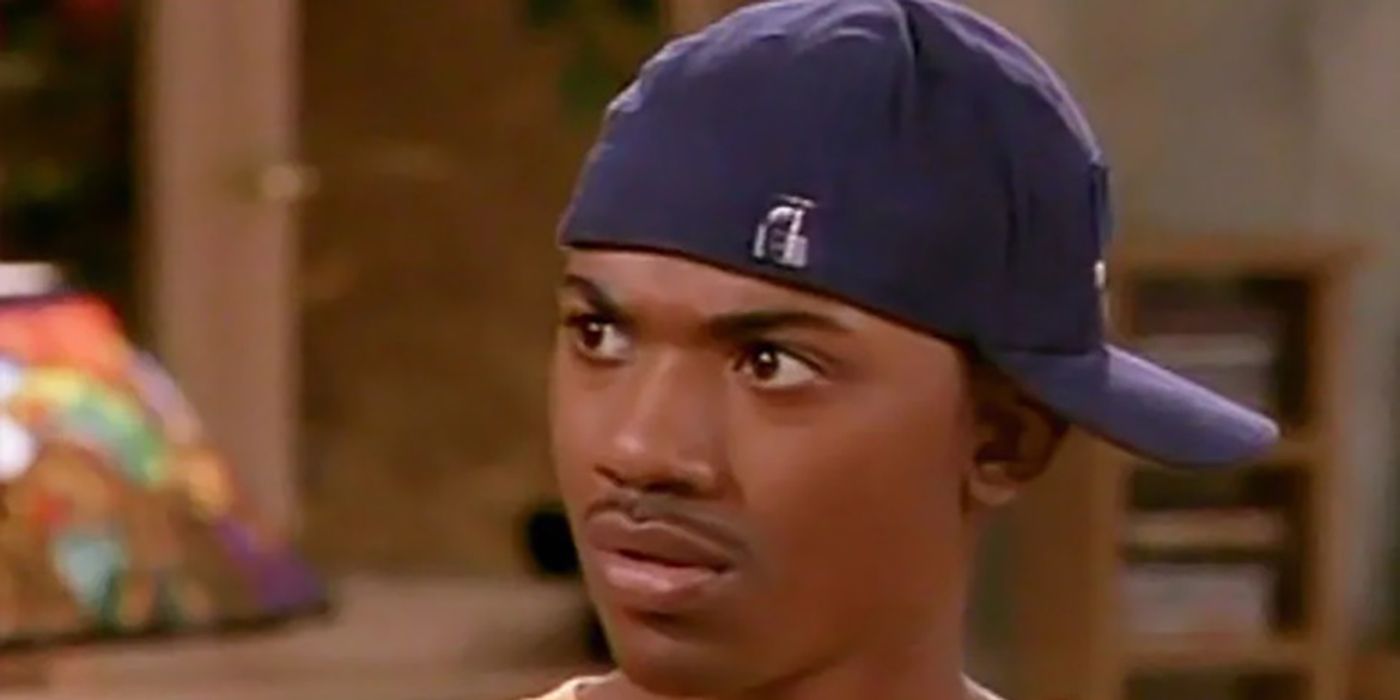 A close-up of Ray J as Dorian in Moesha wearing a hat backwards.