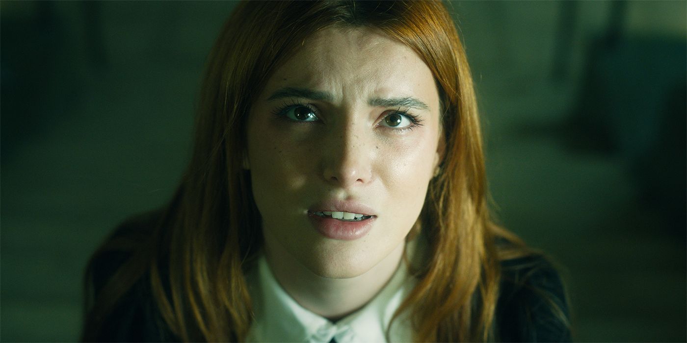 Clare Bleecker looking up with a concerned expression in Saint Clare