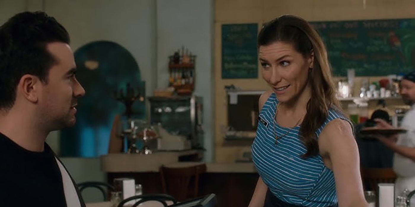 David and Twyla talking in Schitt's Creek.