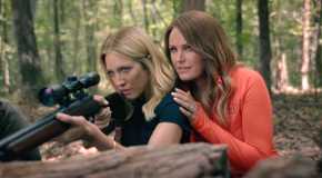 Brittany Snow as Sophie learning how to use a gun with Malin Åkerman as Margo in The Hunting Wives