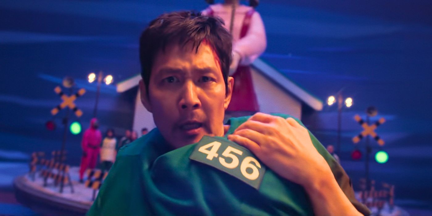Gi-hun (Lee Jung-jae) makes the jump rope gap jump with Jun-hee's baby in Squid Game Season 3.