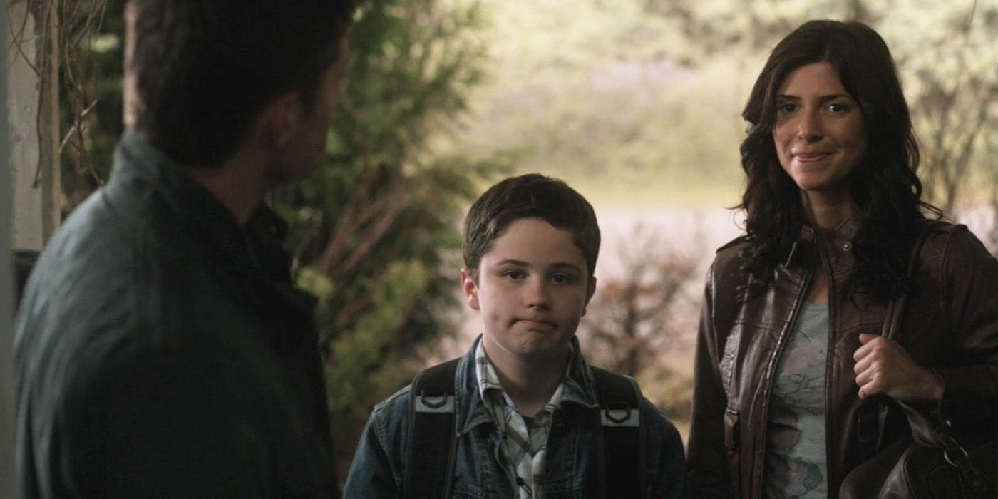 Dean Winchester (Jensen Ackles) with Ben (Nicholas Elia) and Lisa Braeden (Cindy Sampson) on 'Supernatural.'