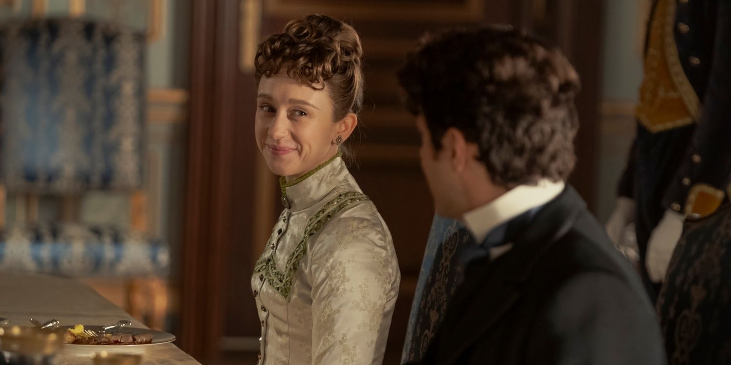 Taissa Farmiga as Gladys sitting at the table in The Gilded Age Season 3