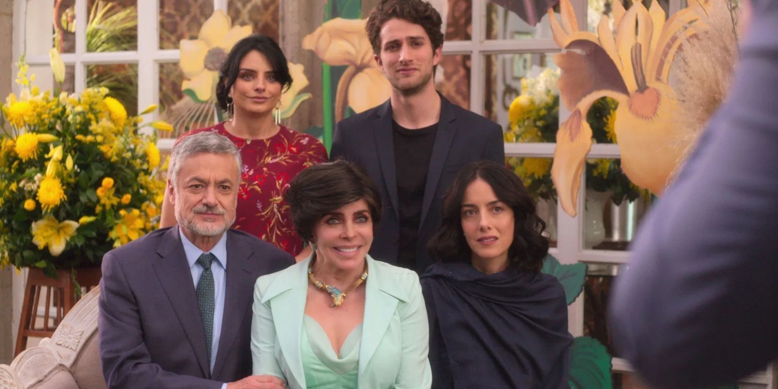 The de la Mora family posing for a photo in The House of Flowers