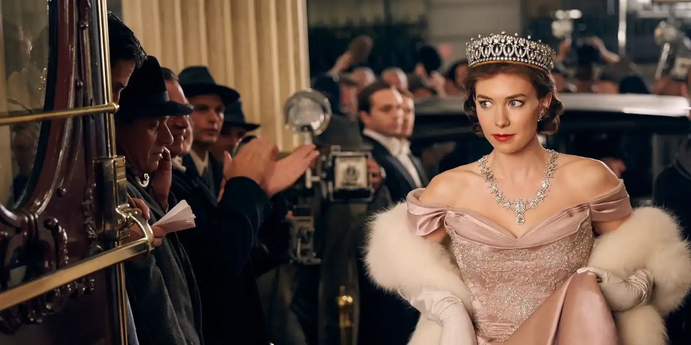 Princess Margaret (Vanessa Kirby) entering a hotel in a ballgown and a tiara, smirking ever so slightly as she looks towards the paparazzi