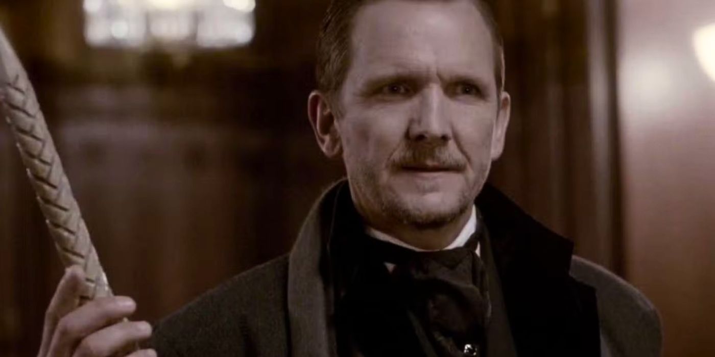 Sebastian Roche as Mikael holding a staff in The Vampire Diaries.