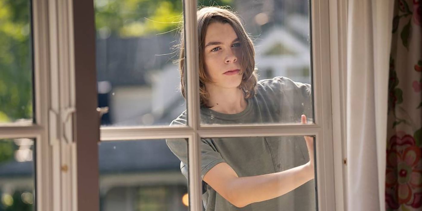 Wyatt peering through a window in And Just Like That...