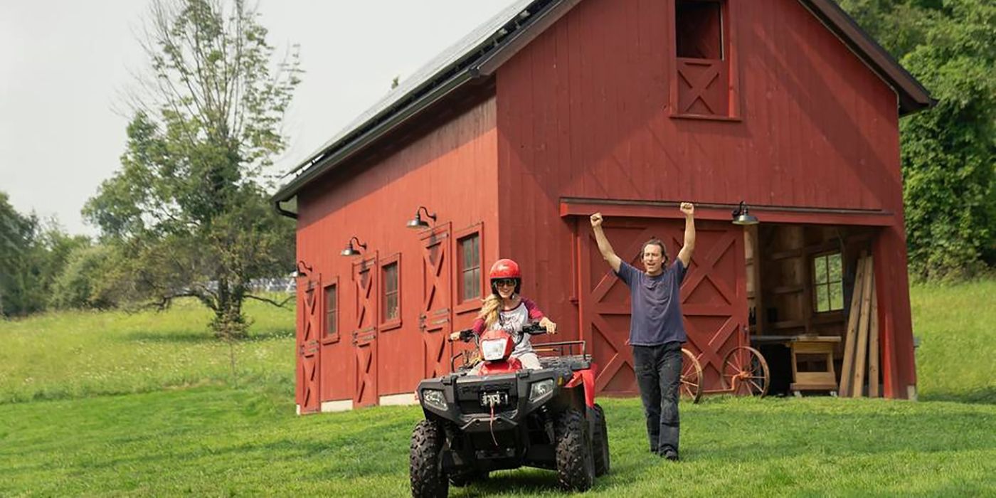 Carrie on an ATV while Aidan cheers in the background in And Just Like That...