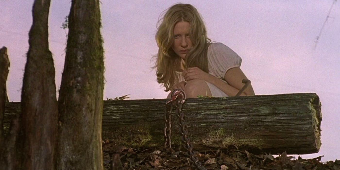 Annie has a vision of trees brought down by the pond, wrapped in rusted chains. She cowers behind a log in her nightgown in The Gift.