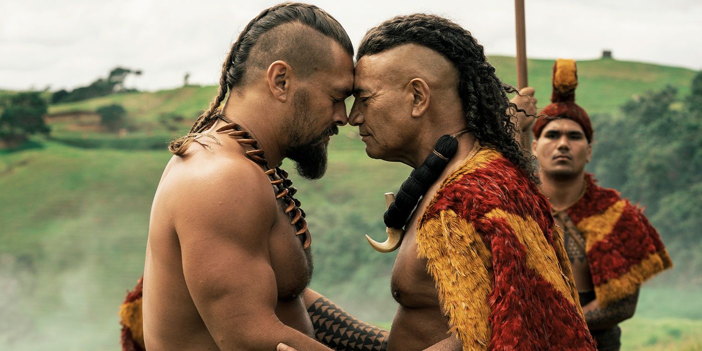 Jason Momoa and Temuera Morrison embracing in Chief of War