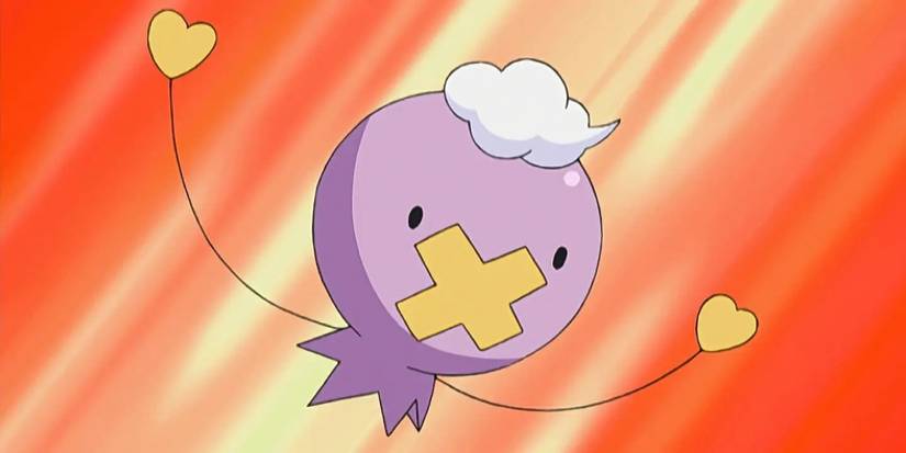 Drifloon about to attack while holding up its string-arms in the Pokemon anime series.