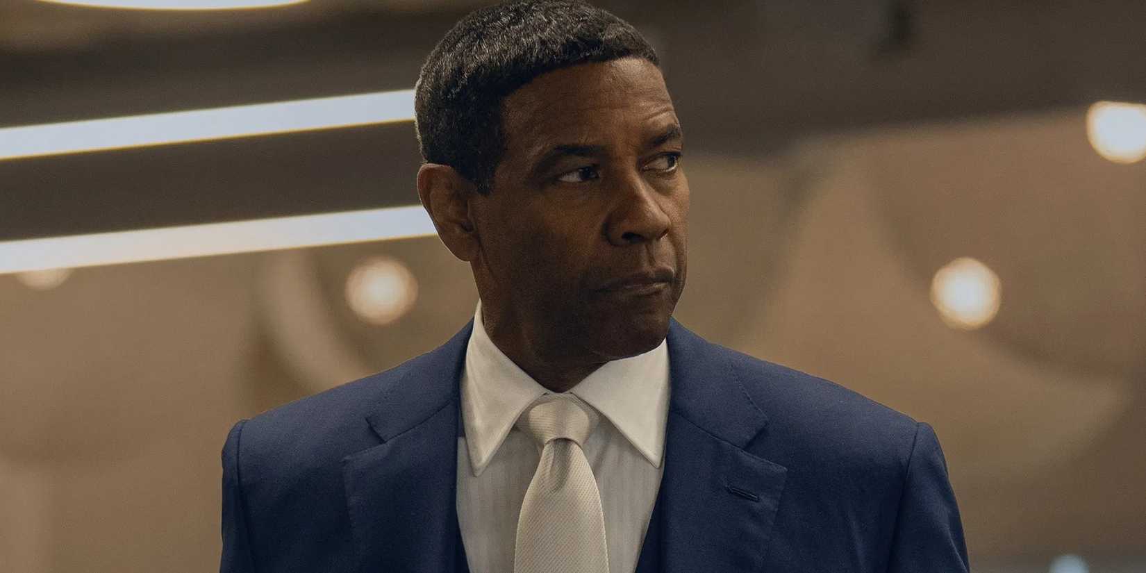 Actor Denzel Washington as David King, looking to the side suspiciously in Highest 2 Lowest.