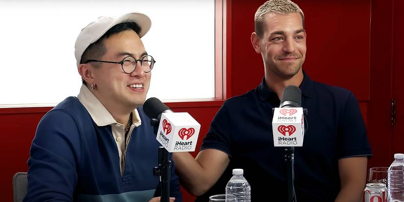 Matt Rogers and Bowen Yang laugh while recording Las Culturistas