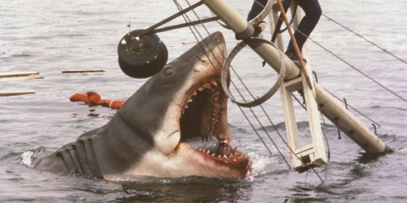 The shark from Jaws (1975) lunging at a sinking boat during the movie's climax