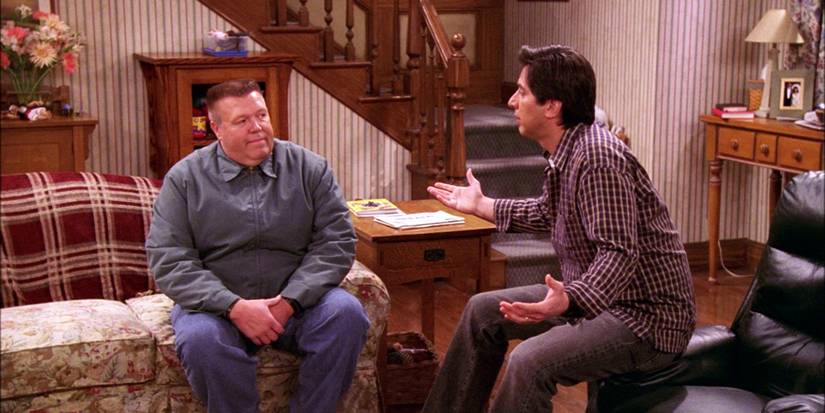 Joel McKinnon Miller and Ray Romano talking in The Faux Pas episode of Everybody Loves Raymond.