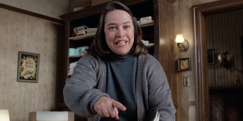 Kathy Bates as Annie Wilkes looking sinister and deranged in Misery (1990)