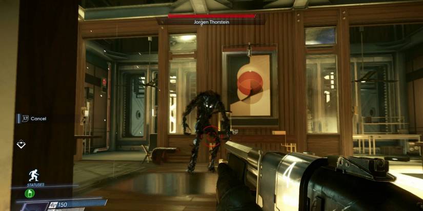 Man holding a gun while a dark creature approaches in Prey