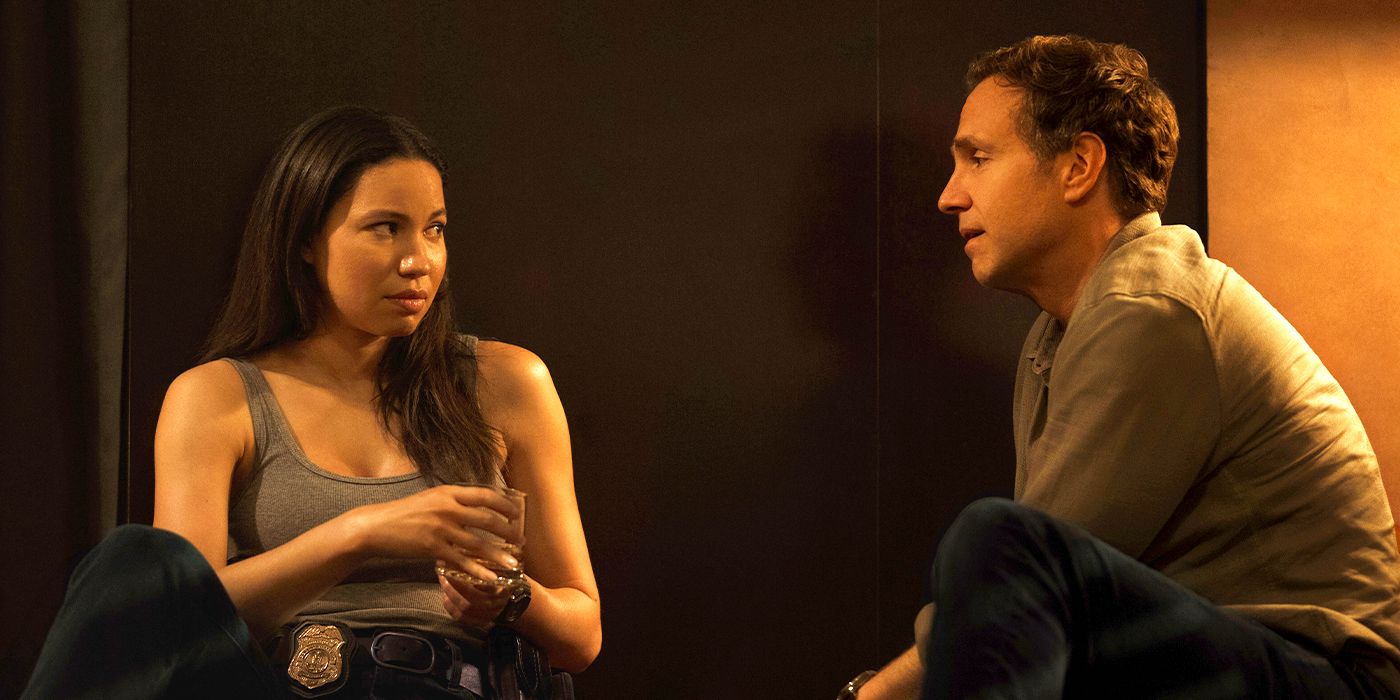 Jurnee Smollett and Rafe Spall as Calderone and Burke talking in Episode 8 of Smoke on Apple TV+