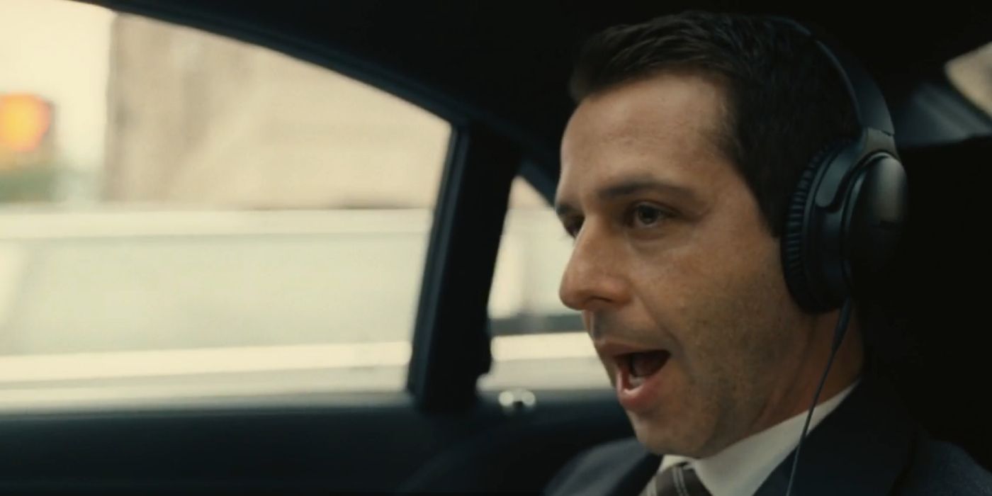 Kendall raps along to the music he's listening to in the opening episode of Succession, Celebration.