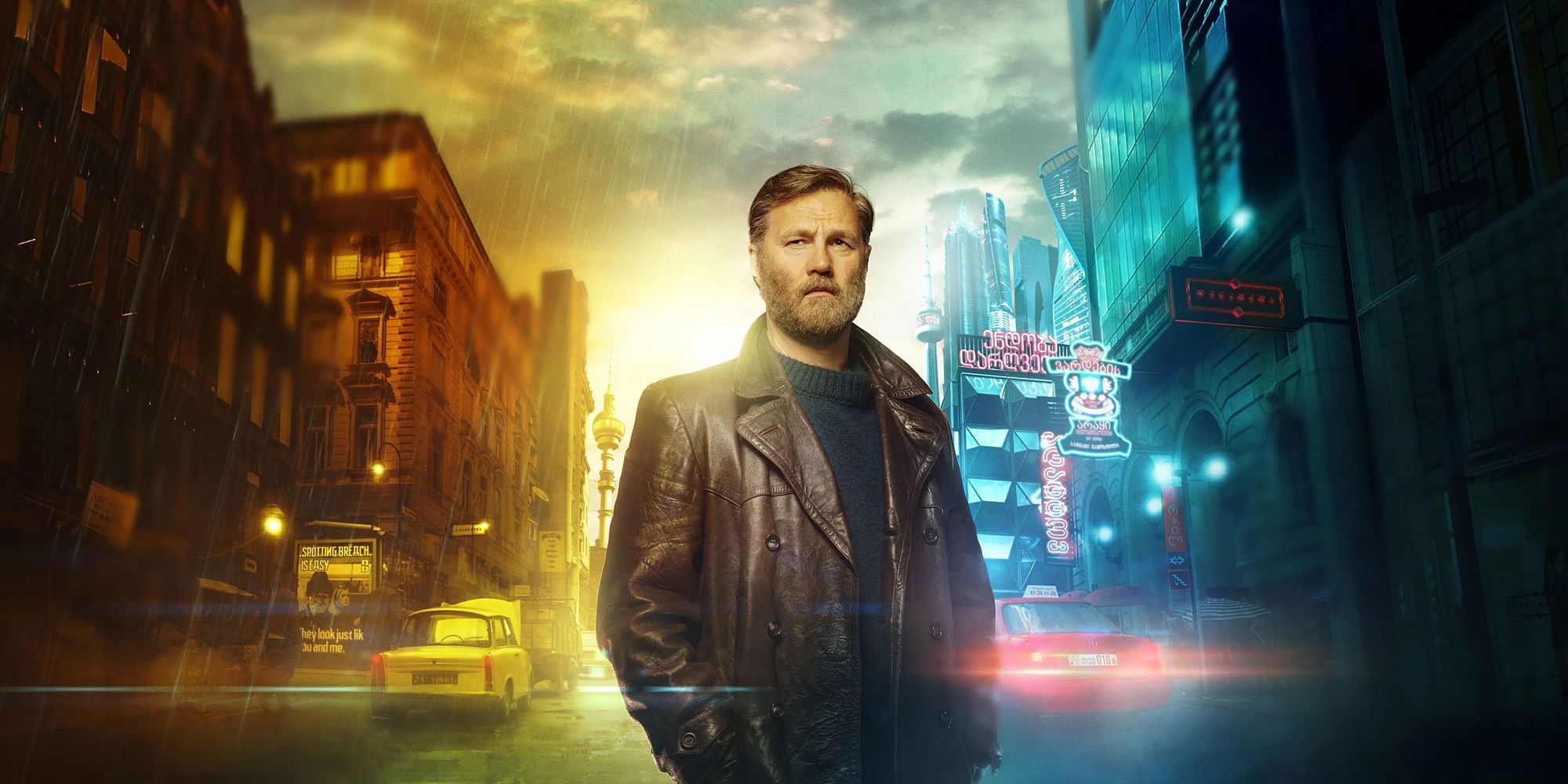 David Morrissey standing on an urban street with light behind on a poster for The City and the City. 
