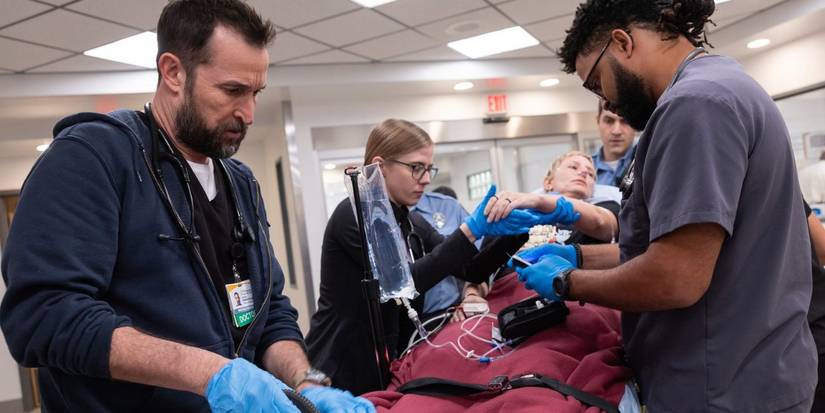 Noah Wyle performing an operation as Dr Robby in 'The Pitt'