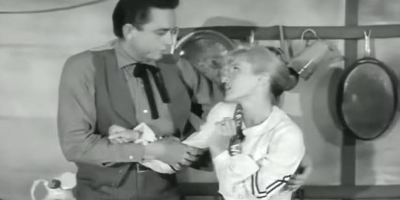 Frank Hoag (Johnny Cash) and his wife Arletta Hoag (Amzie Strickland) in the 'Wagon Train' episode "The C.L. Harding Story."