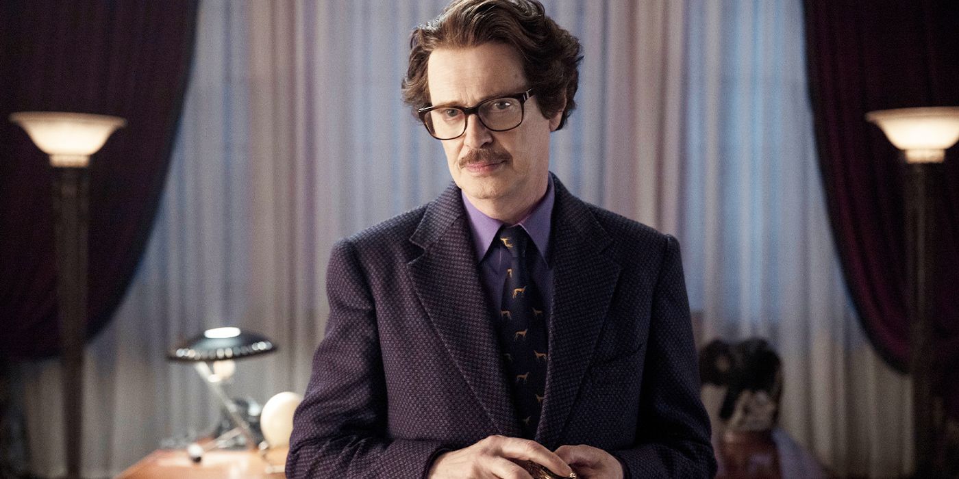 Steve Buscemi as Principal Barry Dort looking past the camera in Wednesday Season 2.