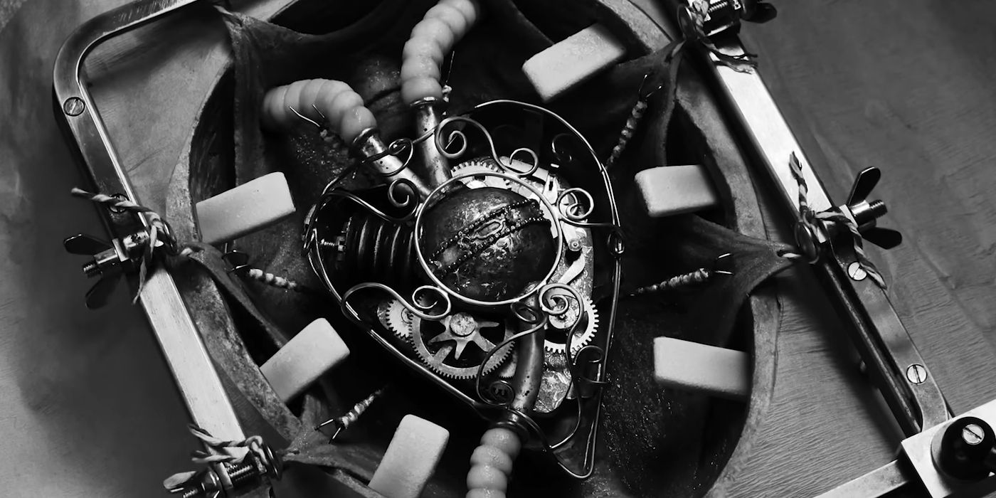 A close up of a mechanical heart for the boy of the Skull Tree legend in Wednesday season 2.