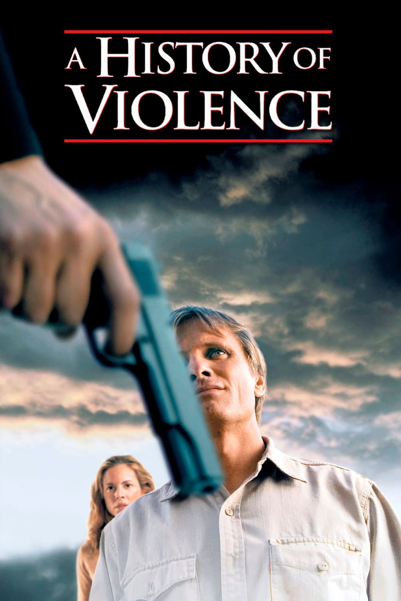 A History of Violence Movie Poster showing A person Holding a Gun in Front of Viggo Mortensen's face