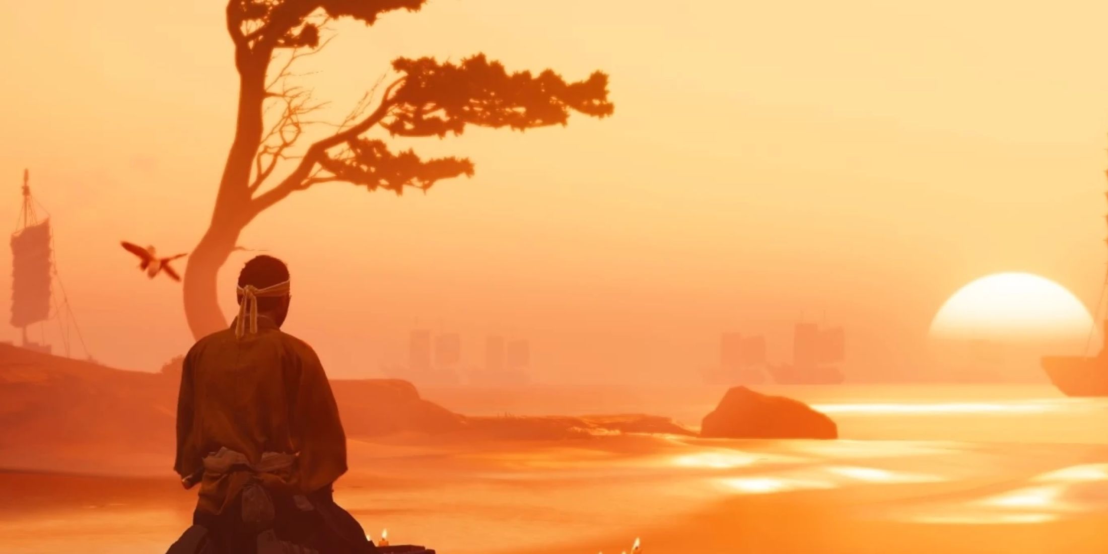 A samurai kneeling before the horizon in Ghost of Tushima
