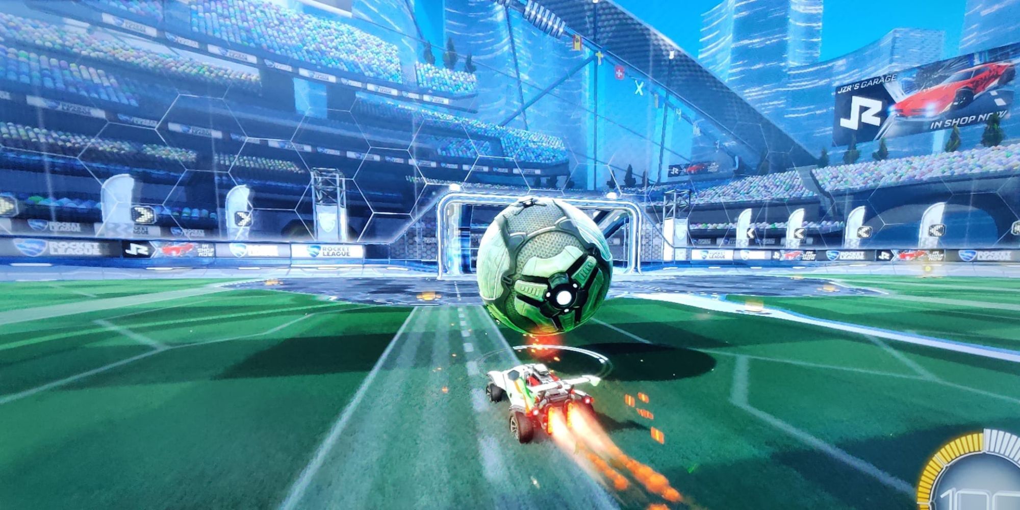 Two vehicles racing in the game Rocket League