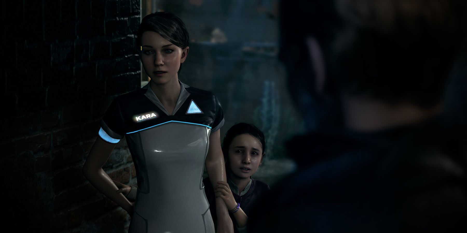 A girl hiding behind a woman while talking to a man with his back to the camera in Detroit Become Human