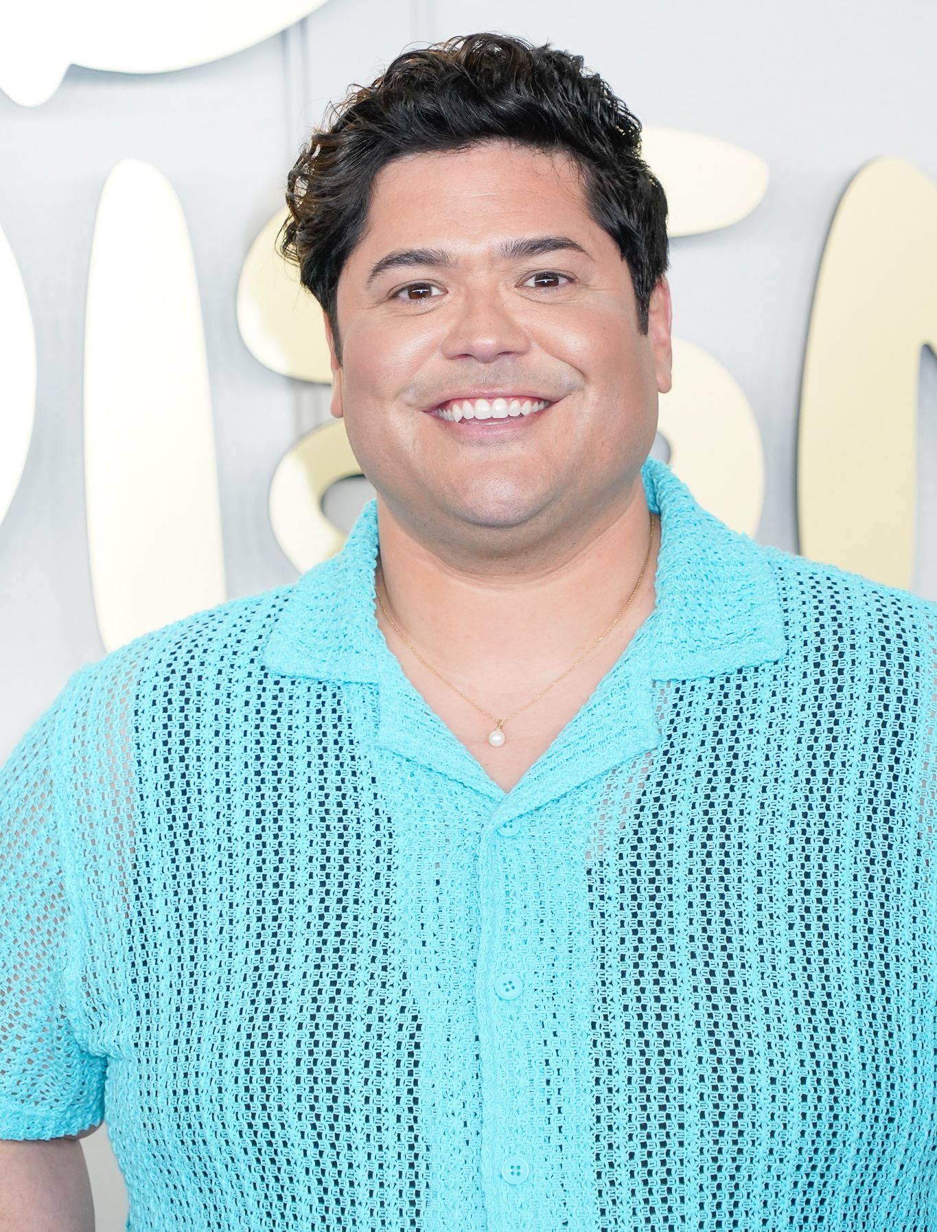Headshot Of Harvey Guillén