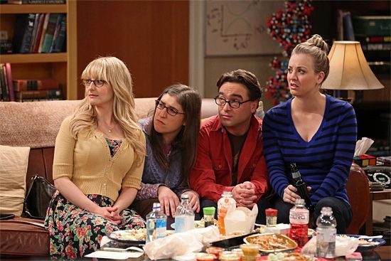 Bernadette, Amy, Leonard, and Penny look off to the side on The Big Bang Theory