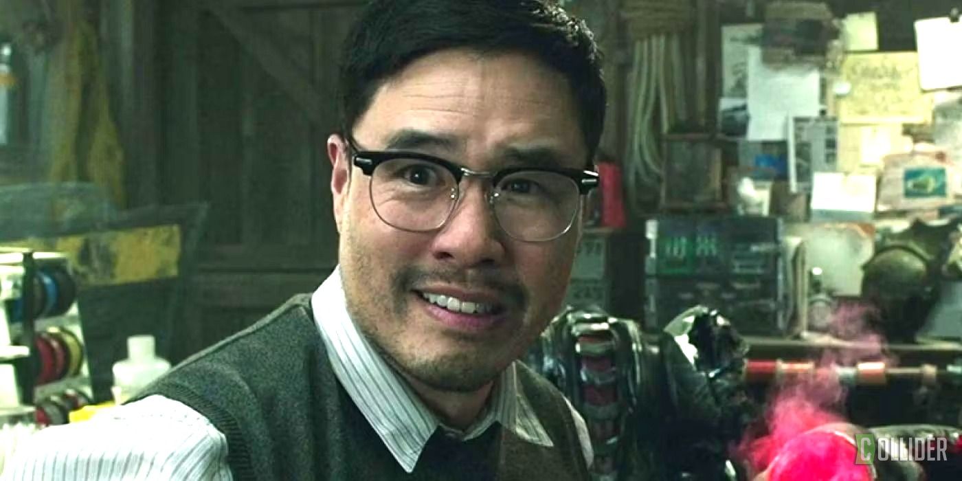 Randall Park as Dr. Stephen Shin looking back at a person offscreen in Aquaman